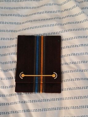 Fiorentini + Baker Black Leather Foldover Clutch with Blue and Tan Stripes